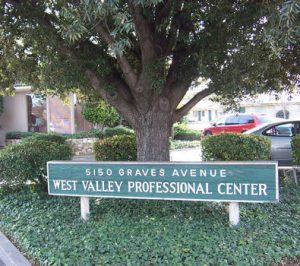 West Valley Professional Center, 5150 Graves Avenue Sign with a tree and cars in the background